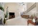 Open living room with fireplace, neutral carpet, and staircase leading to upper level at 2900 Sutton Pl, Conyers, GA 30013