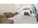 Large living room with fireplace and open to dining area at 2900 Sutton Pl, Conyers, GA 30013