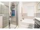Clean bathroom with a shower, tub, and elegant tile work at 2909 Emme Ct, Conyers, GA 30094