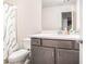 Full bathroom featuring a modern vanity, mirror, and shower-tub combination at 2909 Emme Ct, Conyers, GA 30094