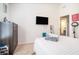 Bright bedroom with a TV, modern decor, and wall art at 2909 Emme Ct, Conyers, GA 30094