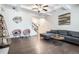 Stylish living room featuring hardwood floors, modern decor, and a comfortable gray sofa at 2909 Emme Ct, Conyers, GA 30094