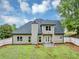 View of backyard with siding, windows, lawn, and privacy fence at 3190 Water Brook Sw Dr, Conyers, GA 30094