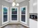 Charming breakfast nook with a bay window, providing natural light and a cozy dining atmosphere at 3190 Water Brook Sw Dr, Conyers, GA 30094