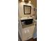 Functional bathroom with vanity, mirror, and tile floors providing essential amenities at 4965 N Bridges Dr, Alpharetta, GA 30022