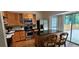 Bright kitchen with stainless appliances, a center island, and a view of the deck at 4965 N Bridges Dr, Alpharetta, GA 30022