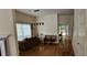 Open-concept living room with hardwood floors and a view of the back deck at 4965 N Bridges Dr, Alpharetta, GA 30022