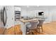 Modern kitchen with stainless steel appliances, granite countertops, and a central island at 827 Holly Rdg, Canton, GA 30115