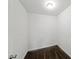 Small closet with neutral walls and carpeting. Great storage space at 1275 Kelly Nelson Dr, Lawrenceville, GA 30043