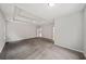 Open main bedroom with neutral paint and carpet at 1275 Kelly Nelson Dr, Lawrenceville, GA 30043