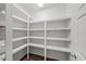 Walk-in pantry with ample shelving and storage space for all your culinary needs at 1275 Kelly Nelson Dr, Lawrenceville, GA 30043