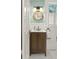 Charming bathroom features a modern vanity and a stylish mirror complemented by chic fixtures and neutral finishes at 2054 Palifox Ne Dr, Atlanta, GA 30307