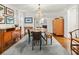 A well-appointed dining room showcasing hardwood floors, contemporary decor, and a serene, inviting ambiance at 2054 Palifox Ne Dr, Atlanta, GA 30307