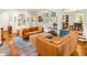 Bright living room with hardwood floors, stylish sofas, and open layout leading to the dining area at 2054 Palifox Ne Dr, Atlanta, GA 30307
