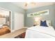 Comfortable bedroom showcasing natural light, tile floors, double closet and view to the main living area at 2197 Fairway Ne Cir, Brookhaven, GA 30319
