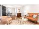 Bright living room flows into dining area, showcasing hardwood floors and natural light at 2197 Fairway Ne Cir, Brookhaven, GA 30319