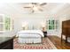Spacious main bedroom with hardwood floors, ample natural light, and a cozy ambiance at 2197 Fairway Ne Cir, Brookhaven, GA 30319