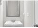 Bathroom featuring white vanity with granite countertop and modern fixtures at 2340 Manor Pointe Dr, Cumming, GA 30041