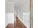 Bright foyer with hardwood floors and paneled wainscoting at 2340 Manor Pointe Dr, Cumming, GA 30041