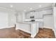 Modern kitchen featuring gray cabinets, granite countertops and stainless steel appliances at 2340 Manor Pointe Dr, Cumming, GA 30041