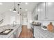 Spacious kitchen featuring granite countertops, stainless steel appliances, and modern gray cabinetry at 2340 Manor Pointe Dr, Cumming, GA 30041
