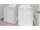 Laundry room with modern washer and dryer at 2340 Manor Pointe Dr, Cumming, GA 30041