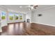 Bright living room featuring hardwood floors and a fireplace at 2340 Manor Pointe Dr, Cumming, GA 30041