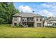 This property features a spacious backyard with a deck perfect for entertaining, and a lovely brick exterior at 241 Russell Rd, Lawrenceville, GA 30043