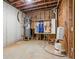 Unfinished basement shows updated water system, and is ready to be customized at 241 Russell Rd, Lawrenceville, GA 30043