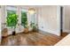 Sun-drenched breakfast nook with views of the mature greenery at 241 Russell Rd, Lawrenceville, GA 30043