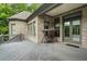 This spacious deck includes a porch swing, brick exterior, and a walkout, offering a perfect blend of indoor and outdoor living at 241 Russell Rd, Lawrenceville, GA 30043