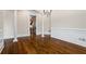 Spacious dining room includes decorative columns, elegant trim, and an open doorway to the kitchen at 241 Russell Rd, Lawrenceville, GA 30043
