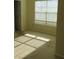 This bedroom has a window with blinds, neutral walls, and neutral carpeting at 804 Bridle Cove, Stockbridge, GA 30281