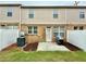 Backyard with patio, privacy fence, and outdoor space for entertaining at 2351 Attewood Dr, Buford, GA 30519