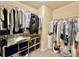 Well-organized walk-in closet with ample storage and shelving at 2351 Attewood Dr, Buford, GA 30519