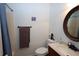 Bathroom featuring a shower, a vanity, a toilet, and a mirror at 236 Hiram Sudie Rd, Dallas, GA 30157