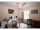 Bedroom containing work out equipment, a ceiling fan, a desk and a carpeted floor at 236 Hiram Sudie Rd, Dallas, GA 30157