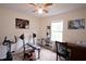 Bedroom containing work out equipment, a ceiling fan, a desk and a carpeted floor at 236 Hiram Sudie Rd, Dallas, GA 30157