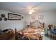 Neutral bedroom features a quaint ceiling fan, and artistic decorations at 236 Hiram Sudie Rd, Dallas, GA 30157
