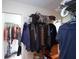 Walk-in closet with ample storage space, multiple rods, and organized shelving at 236 Hiram Sudie Rd, Dallas, GA 30157