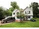 Lovely home boasting a lush lawn, blooming hydrangeas, and a convenient driveway for easy access at 236 Hiram Sudie Rd, Dallas, GA 30157