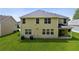Spacious backyard featuring a well-maintained lawn, siding, and a patio area at 2840 Brookford Sw Ln, Atlanta, GA 30331