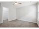 Bedroom featuring neutral walls, carpeting and a walk-in closet at 2840 Brookford Sw Ln, Atlanta, GA 30331