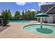 Outdoor community pool area featuring a splash fountain and a large in-ground pool for residents at 2840 Brookford Sw Ln, Atlanta, GA 30331