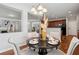 Cozy eat-in kitchen view featuring hardwood floors, a modern chandelier, and kitchen views at 2840 Brookford Sw Ln, Atlanta, GA 30331
