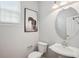 Quaint powder room with modern fixtures and decor at 2840 Brookford Sw Ln, Atlanta, GA 30331