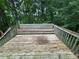 Wooden deck overlooking a wooded backyard at 134 Summer Lake Dr, Dallas, GA 30157