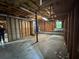Unfinished basement with exposed beams and a small window at 134 Summer Lake Dr, Dallas, GA 30157