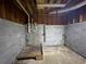 Unfinished basement with concrete block walls and exposed utilities at 134 Summer Lake Dr, Dallas, GA 30157