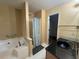 Bathroom with tub/shower combination with granite vanity top and shower at 134 Summer Lake Dr, Dallas, GA 30157